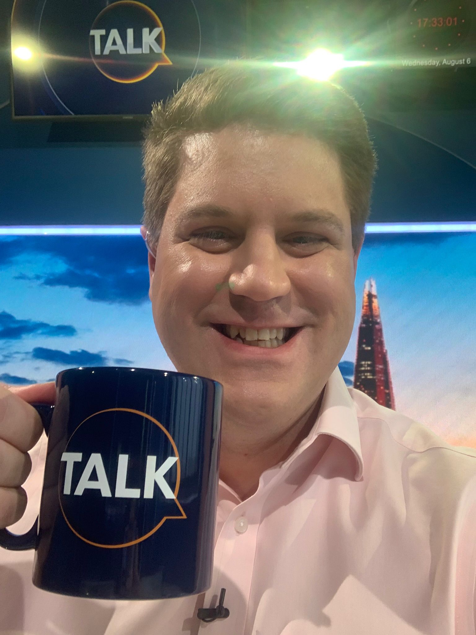 Peter Cardwell headshot on set at Talk Radio